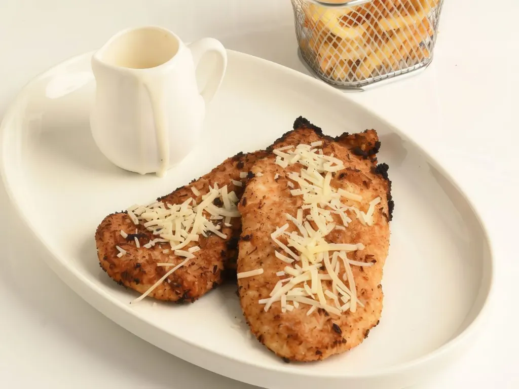 Chicken scallop truffle with potatoes